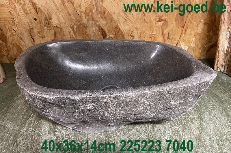 Natural stone washbasin made of river stone