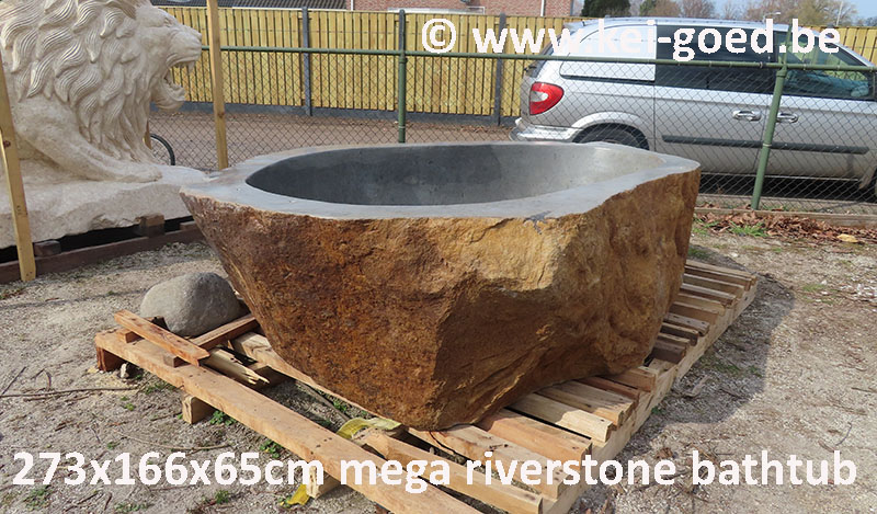 giant bathtube of natural stone