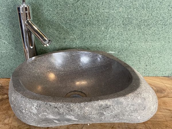 Luxurious natural stone sink made of river stone