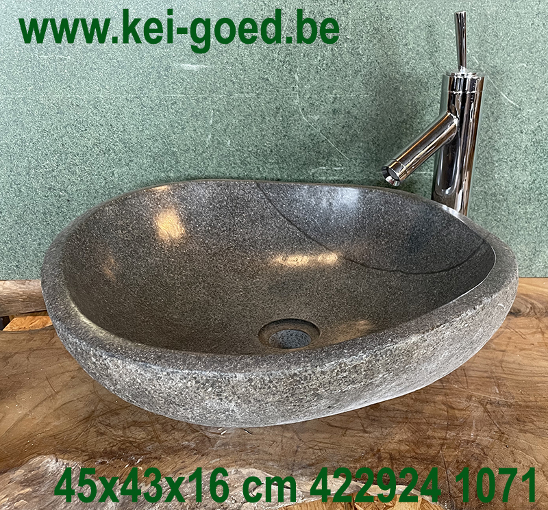 sturdy sink made of river stone